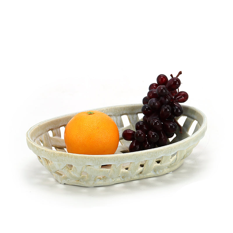 Woven ceramic basket with light coloured fruits Lattice hollow grapes or bananas or apples ceramic basket