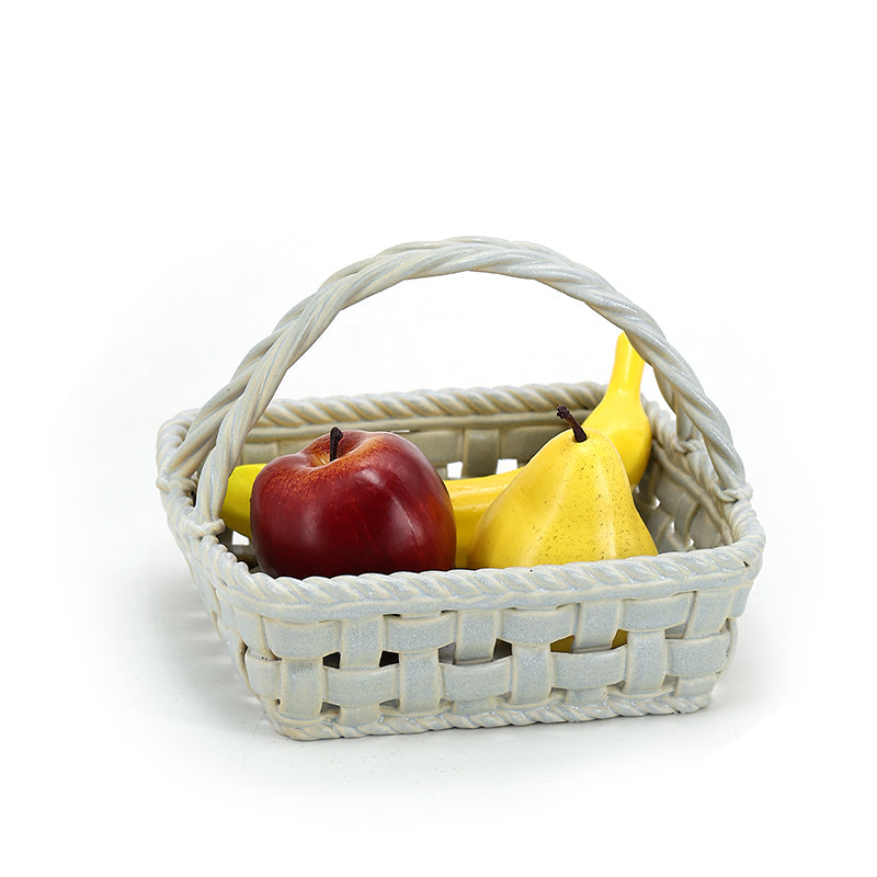 Woven ceramic basket with light coloured fruits Lattice hollow grapes or bananas or apples ceramic basket